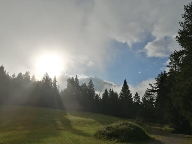 Sun breaking through clouds in Tyrol