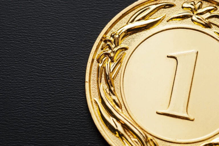Close up of a gold medal for the champion as an expression of the achievement