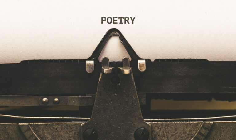 Word poetry written on paper by typewriter