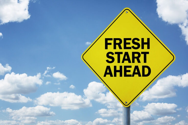 Yellow sign saying fresh start ahead